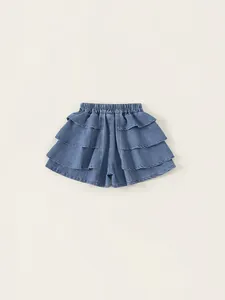 Girls' light blue denim skorts featuring tiered ruffles and elastic waist for summer wear