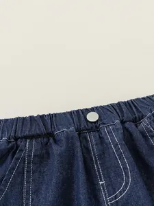 Classic dark blue denim shorts for kids featuring elastic waistband and metal button detail