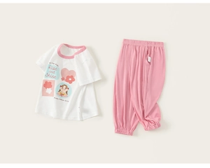 Detailed flat lay of white cartoon print t-shirt and pink casual joggers for girls
