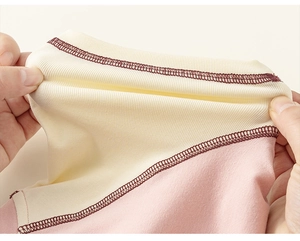 Close-up of high-elasticity ribbed cotton fabric with durable flat-lock stitching detail