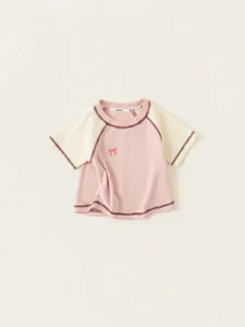 Pink and cream contrast raglan t-shirt for girls with bow print and ribbed texture