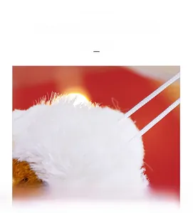 Macro detail of plush white fur texture on Christmas angel doll decoration
