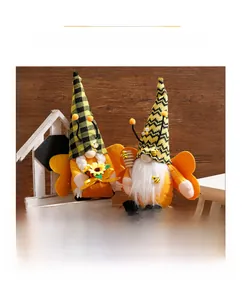 Detail of bee gnomes with striped hats holding sunflowers and honey dippers
