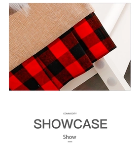 Detail of buffalo plaid fabric and burlap stitching on Christmas chair cover ornament