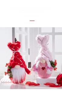 Close-up of illuminated Valentine Rudolph plush dolls with glowing hearts and sequins
