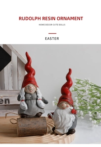 Close-up of resin Rudolph gnomes with red pointed hats on a wooden decorative tray