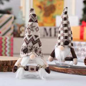 Gnome Christmas candy jars with knitted hats and glass storage for cookies