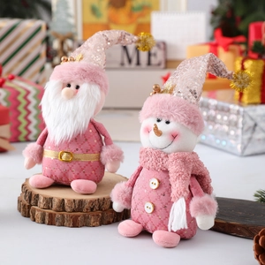 Set di 2 peluche natalizi rosa con renna e pupazzo di neve su basi in legno massiccio