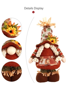 Detail display of harvest gnome plush with sunflower hat, maple leaf and fiber beard