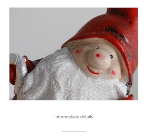 Macro detail of Christmas gnome figurine with red painted hat and silver glitter beard