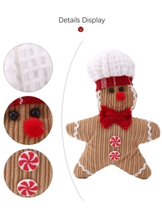 Macro shot of gingerbread plush decor showing waffle textures, buttons, and detailed stitching