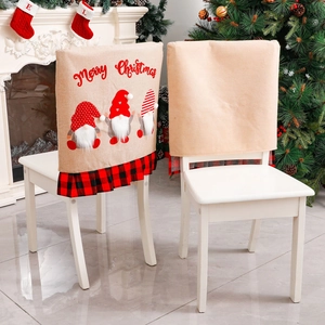 Rudolf Gnome Christmas chair covers with red black plaid trim and Merry Christmas art