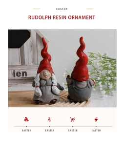 Detailed view of resin Easter gnome ornaments with long red hats and vintage finish