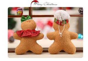 Close-up of plush gingerbread man Christmas ornaments with soft teddy fleece material
