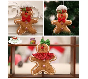 Detailed plush gingerbread man and woman ornaments for Christmas tree decoration