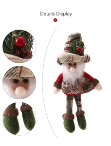 Detail display of Christmas gnome doll with pine cone accent and long green boots
