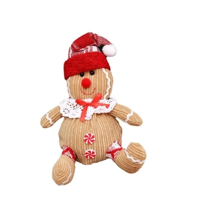 Gingerbread man plush toy with red Christmas hat and peppermint buttons for tree decor