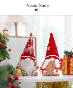 Close-up of handmade Christmas gingerbread gnomes with knit hats and festive decorations