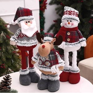 Detail view of festive Christmas plush set with Santa, reindeer and snowman decor