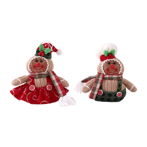 Gingerbread man and woman plush ornaments set with festive hats and winter scarves