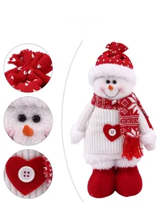 Detailed close-ups showing knitted texture and red heart accents of a Christmas snowman doll