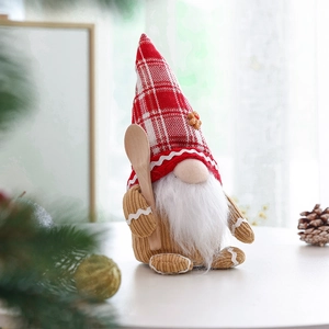 Gingerbread gnome doll with red plaid hat and wooden spoon for Christmas decor