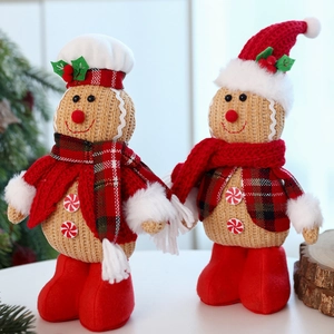 Charming gingerbread plush figures set with festive scarves and hats for holiday decor