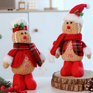 Handcrafted gingerbread knit dolls with chef hat and Christmas scarf on wood base