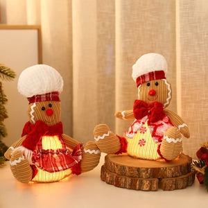 Lighted gingerbread plush set with chef hats and warm glow for Christmas decor