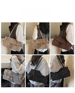 Multiple views of a large capacity faux suede tote bag with woven shoulder straps