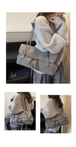 Detail of grey suede tote bag featuring woven shoulder straps and bow tie decoration