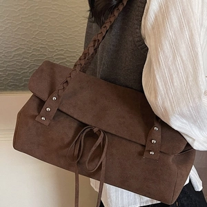Brown large capacity suede tote bag with woven shoulder strap and vintage metal rivets