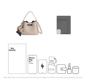 Milk white bucket bag with pebble leather texture showing interior storage capacity