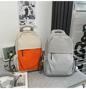 Detail view of versatile commuter backpacks with mesh zipper pockets and ripstop nylon fabric
