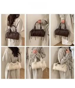 Detail shots of a Boston tote bag with woven handles and stylish side tassel accents