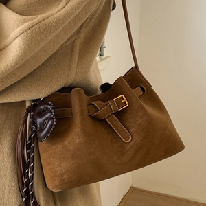 Retro brown suede bucket bag with gold buckle and heart tassel detail for women