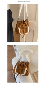 Detailed view of brown suede bucket bag with white faux fur trim and drawstring