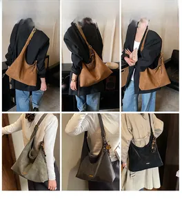 Dettaglio di borse tote Hobo in pelle retrò in vari colori con ornamenti di perline