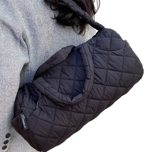 Black quilted down cotton tote bag with diamond pattern and Sleeping Cat brand label