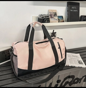 Pink sports gym bag with shoe compartment and breathable side mesh pocket