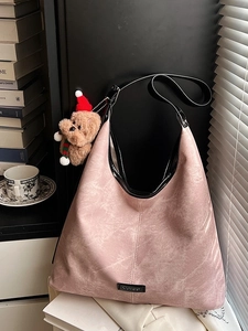 Pink washed texture leather Hobo bucket bag with a cute plush bear charm and black strap