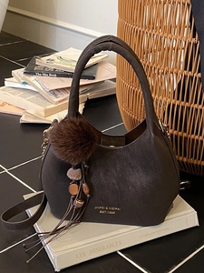 Petit Sac Seau Vintage pour Femme en PU Similicuir Suédé Sac à Épaule Avec Pendentif Pompon et Gland Sac à Main Mode