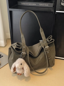 Retro frosted olive green large tote bag with adjustable straps and plush rabbit charm