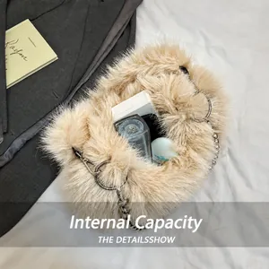 Top view of beige faux fur shoulder bag interior showing capacity for cosmetics and perfume