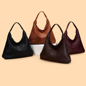 Detail of hobo shoulder bags in woven leather texture available in four elegant colors