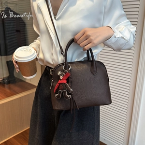 Deep brown litchi pattern shell bag with adjustable strap and cute bear pendant