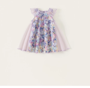 Detail of girls purple fairy dress featuring 3D rainbow floral mesh and ruffled neckline