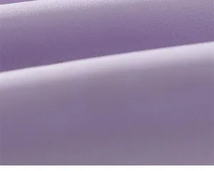 Close-up of soft purple mesh fabric showing fine texture and skin-friendly material