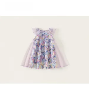 Detail view of purple girls fairy dress with mesh ruffle sleeves and floral patterns