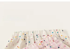Détails de la taille élastique de pantalons pour bébés à pois et à carreaux roses